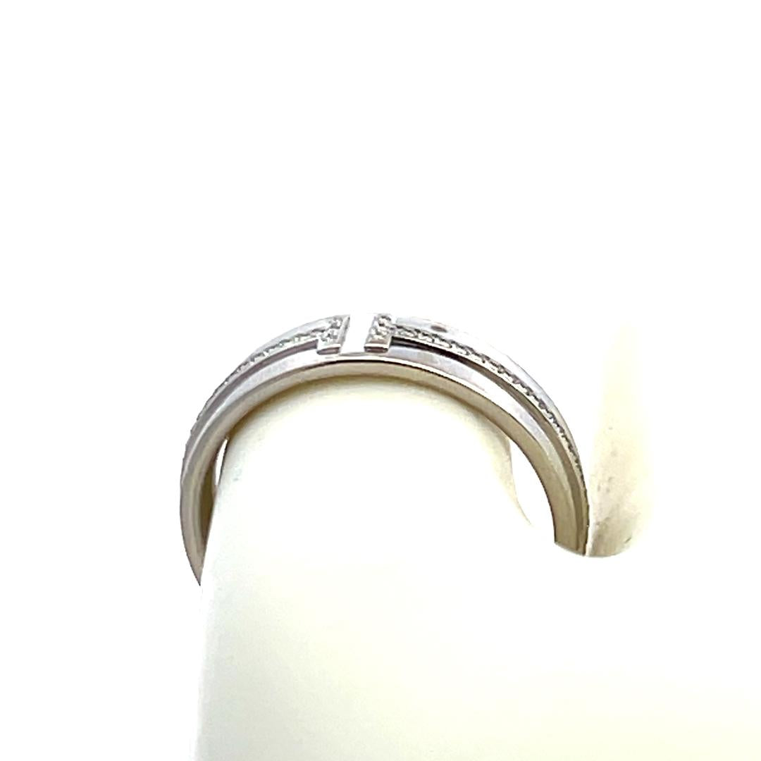 Tiffany & Co 0.13 Carat Round Brilliant Diamond 18 Karat White Gold Band Ring