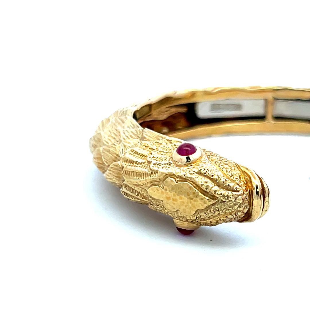 David Webb 18 Karat Yellow Gold Fish Bangle Bracelet with 0.2 Carat Ruby