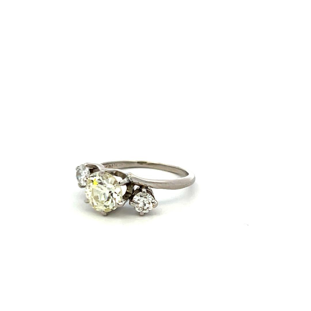 Vintage Three-Stone Platinum Ring with 1.30 Carat Old European cut GIA Diamond
