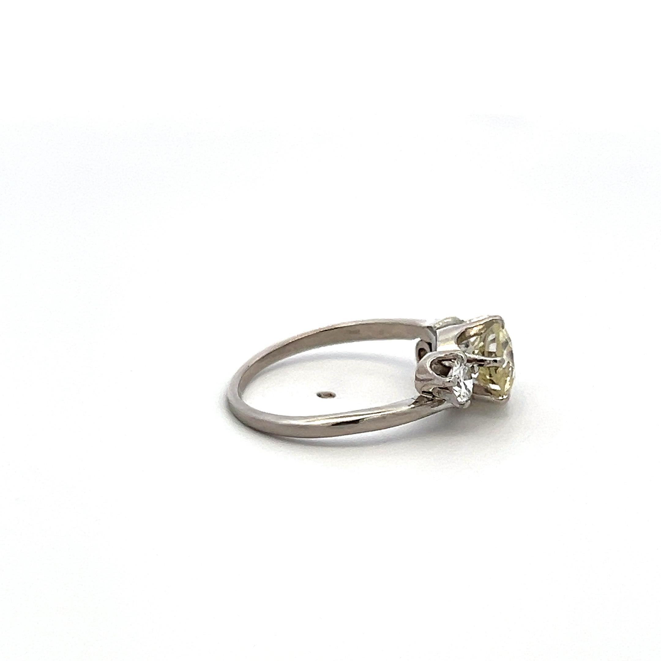 Vintage Three-Stone Platinum Ring with 1.30 Carat Old European cut GIA Diamond