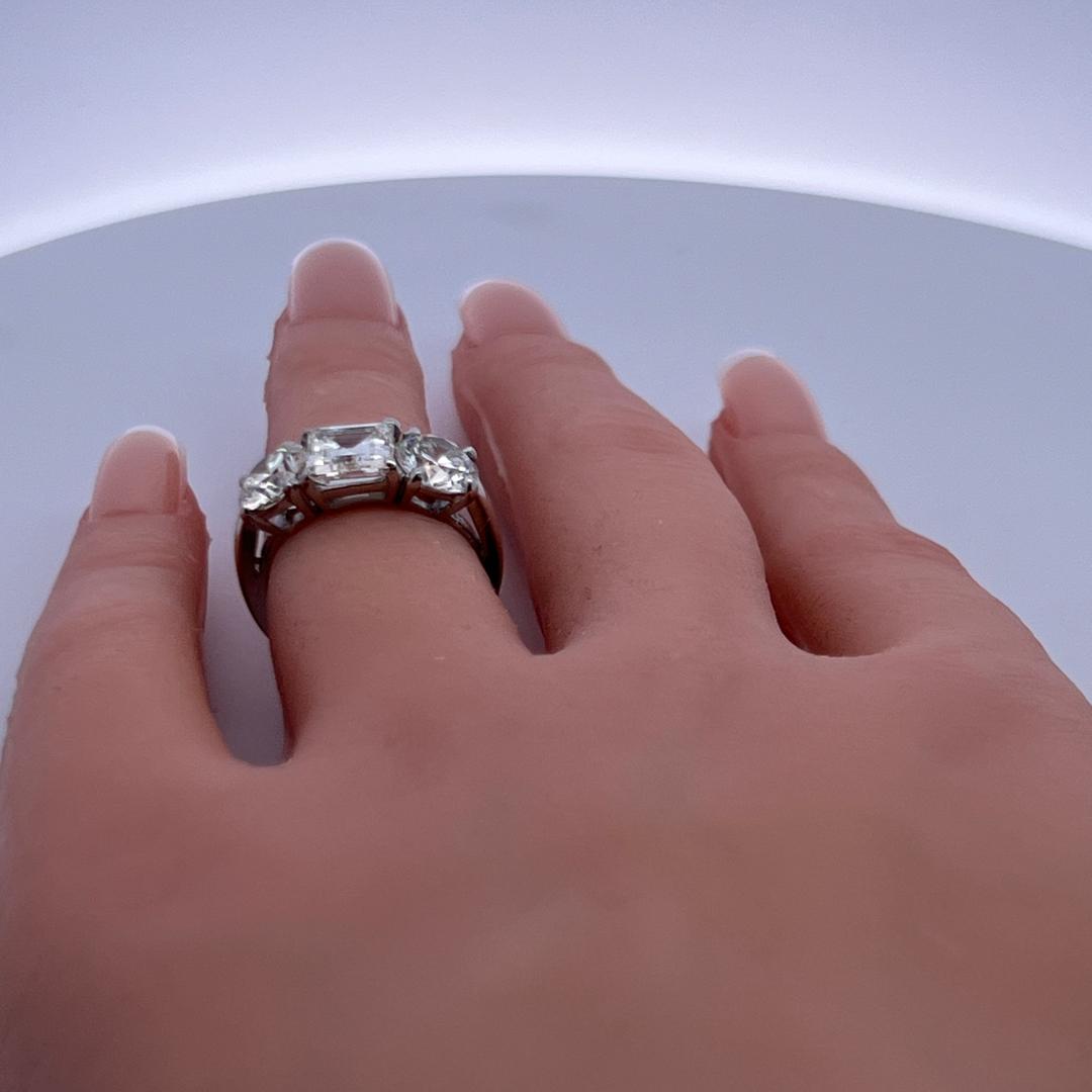 Vintage 4.02 Carat Asscher and Round GIA Diamonds Platinum Three-Stone Ring