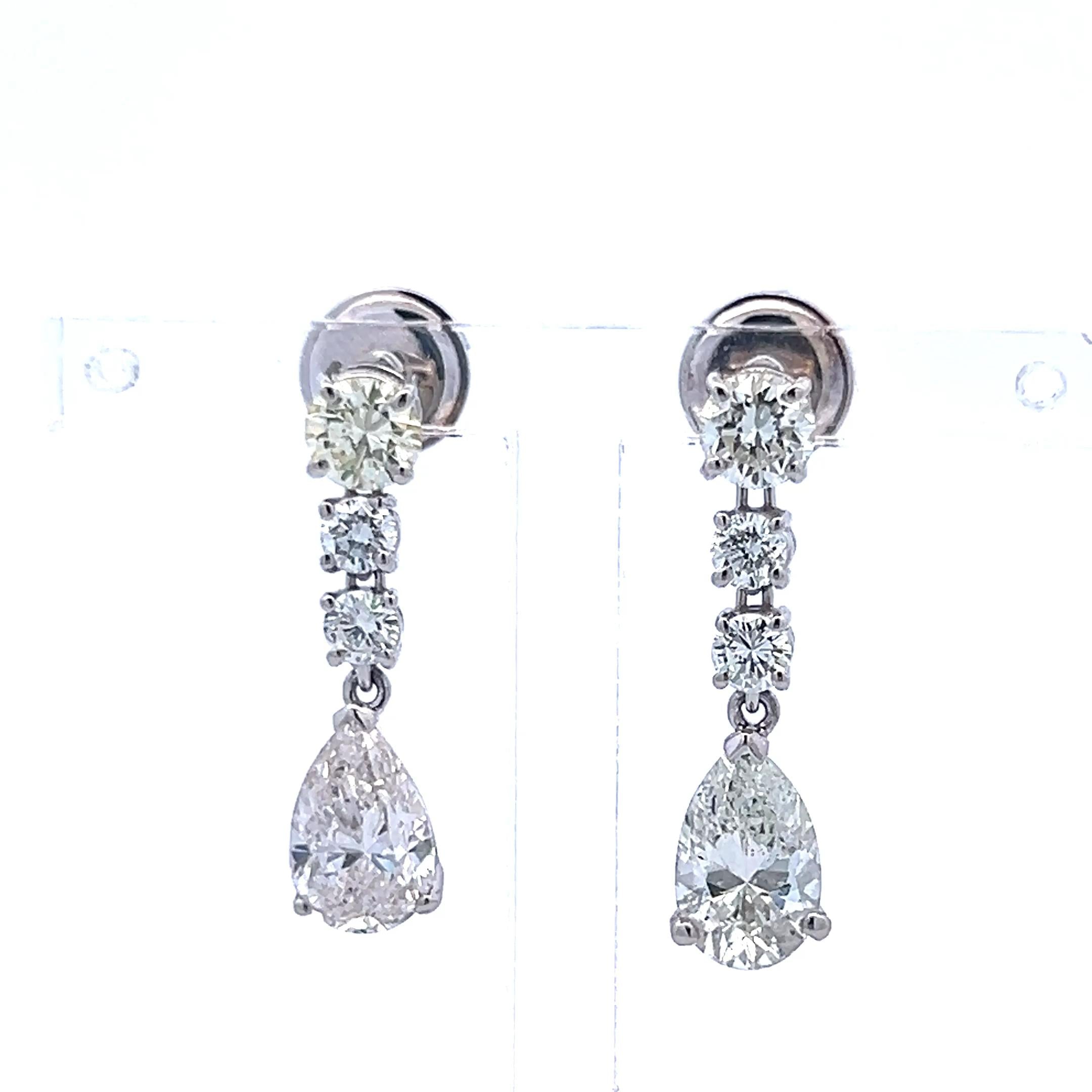 Platinum Drop Earrings with 4.25 Carat Round & Pear Diamonds J SI GIA