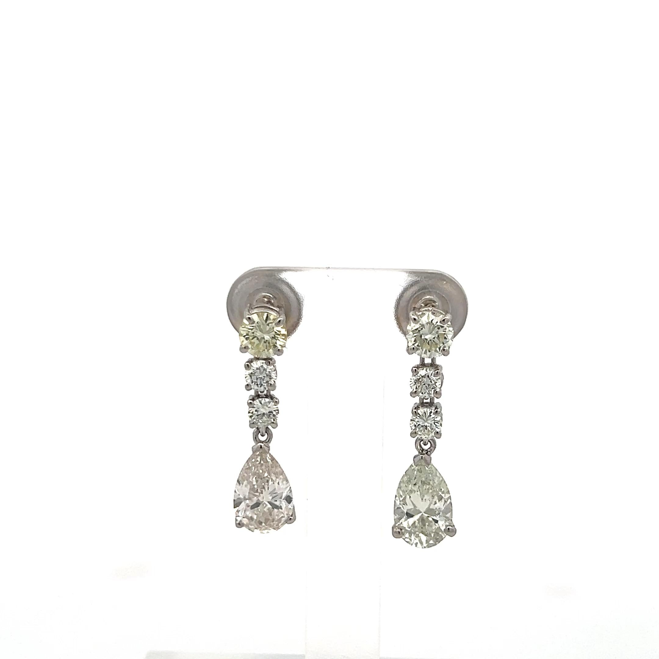 Platinum Drop Earrings with 4.25 Carat Round & Pear Diamonds J SI GIA