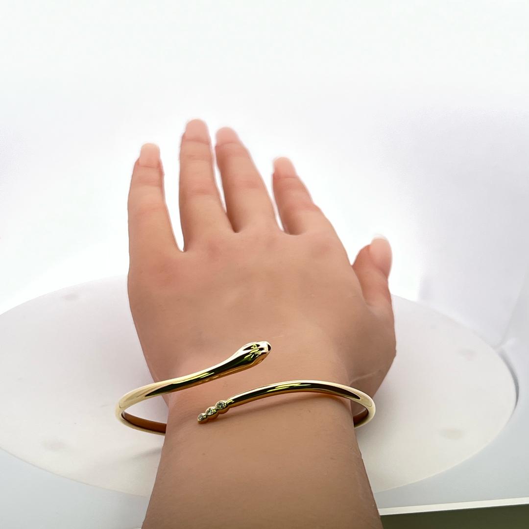 Tiffany & Co 0.06 Carat Round Diamond 18K YG Snake Bangle Bracelet