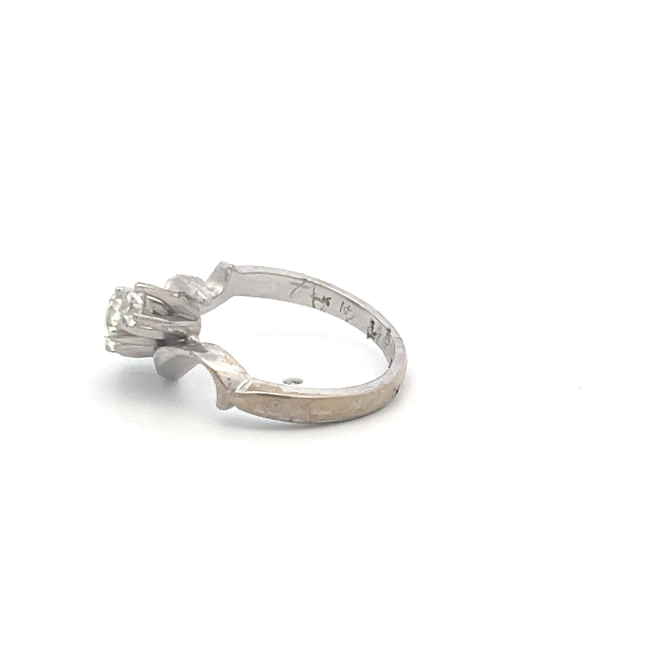 0.60 Carat Round Brilliant K-I VS Diamond 14 Karat White Gold Three-Stone Ring