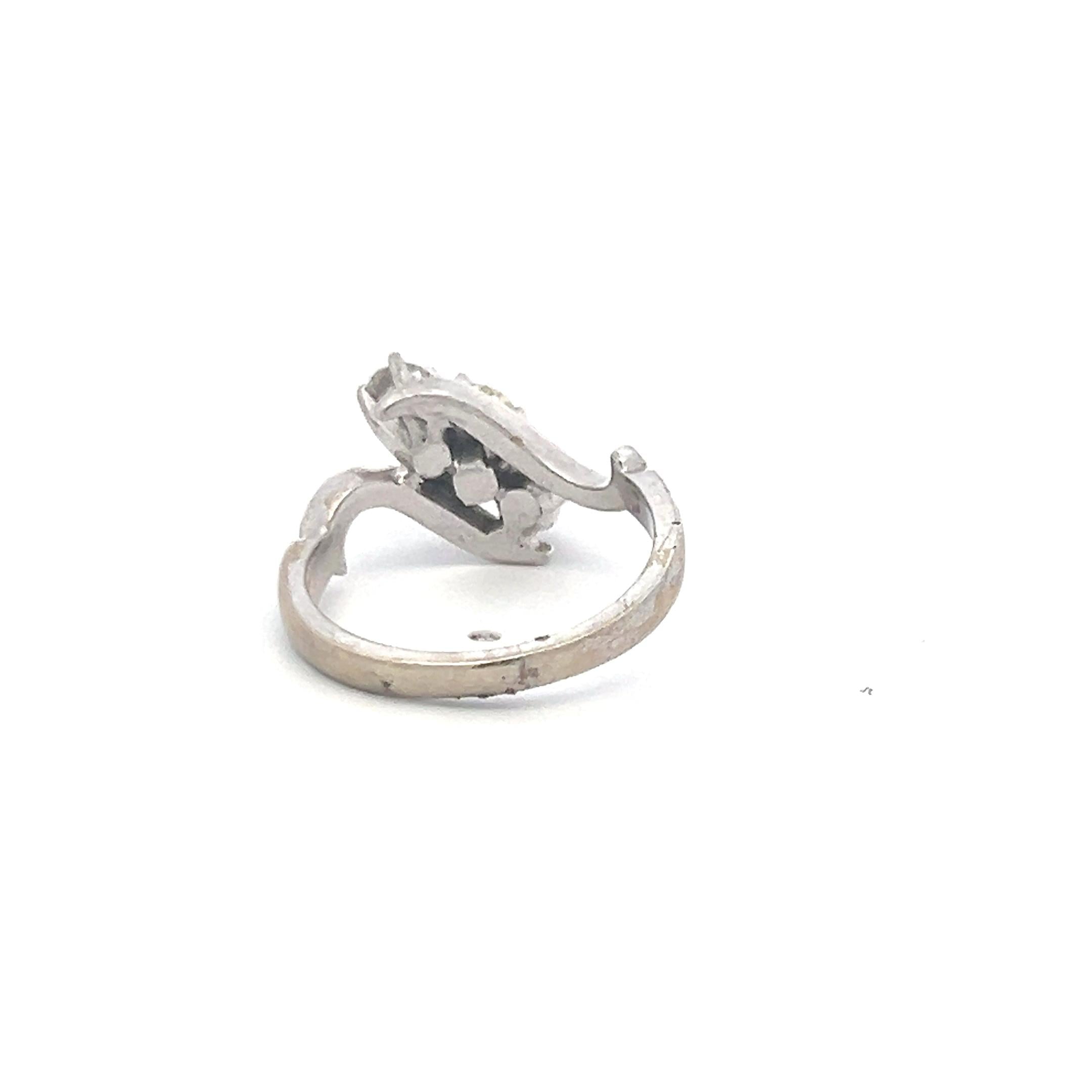 0.60 Carat Round Brilliant K-I VS Diamond 14 Karat White Gold Three-Stone Ring