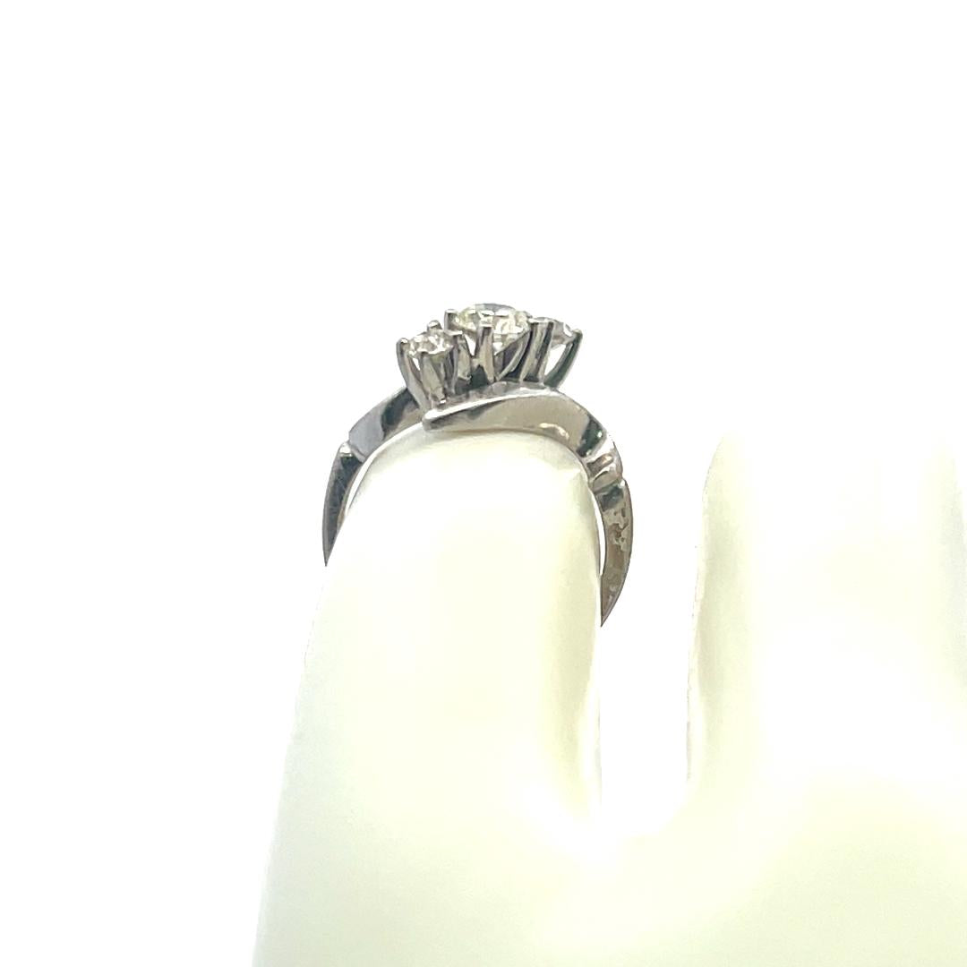 0.60 Carat Round Brilliant K-I VS Diamond 14 Karat White Gold Three-Stone Ring