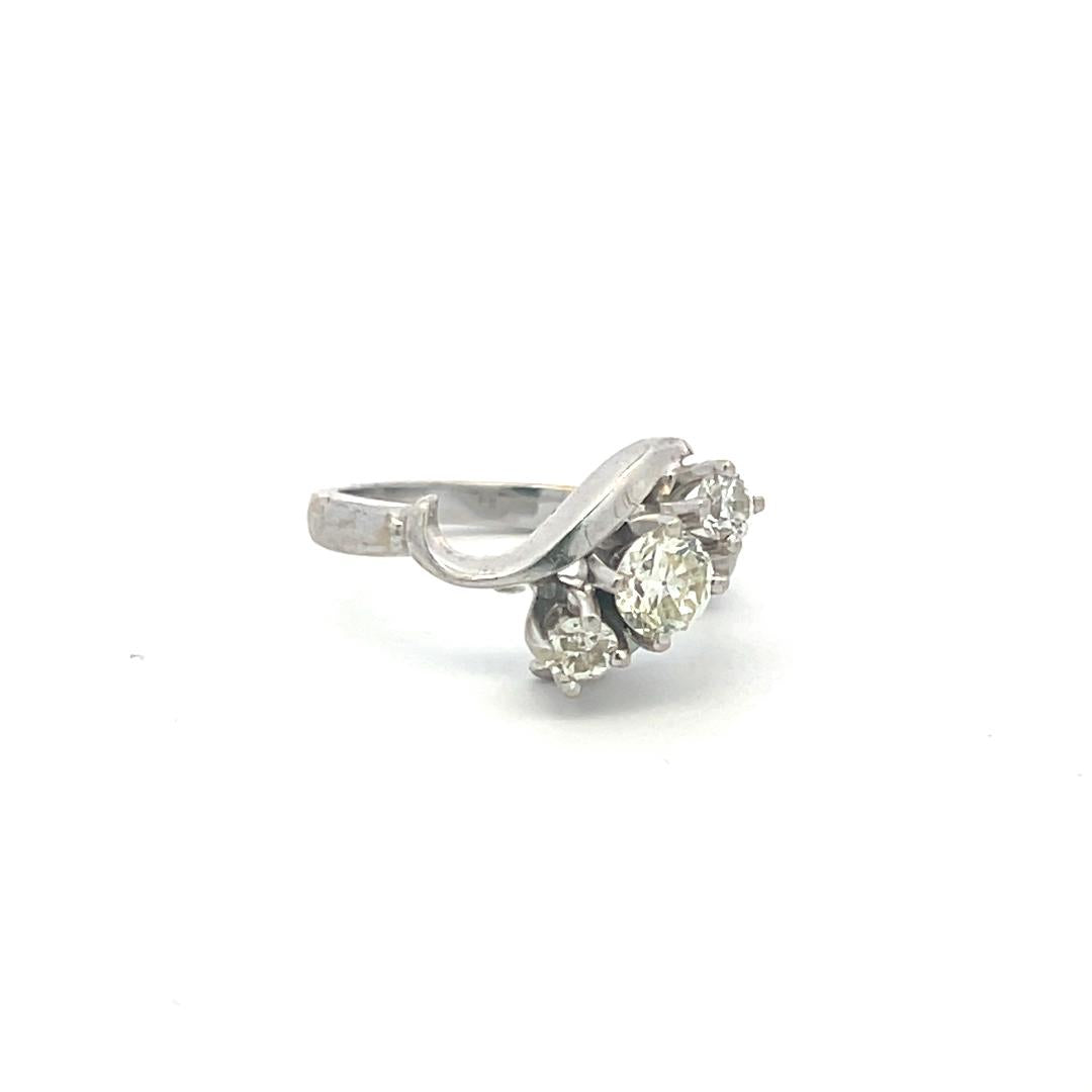 0.60 Carat Round Brilliant K-I VS Diamond 14 Karat White Gold Three-Stone Ring