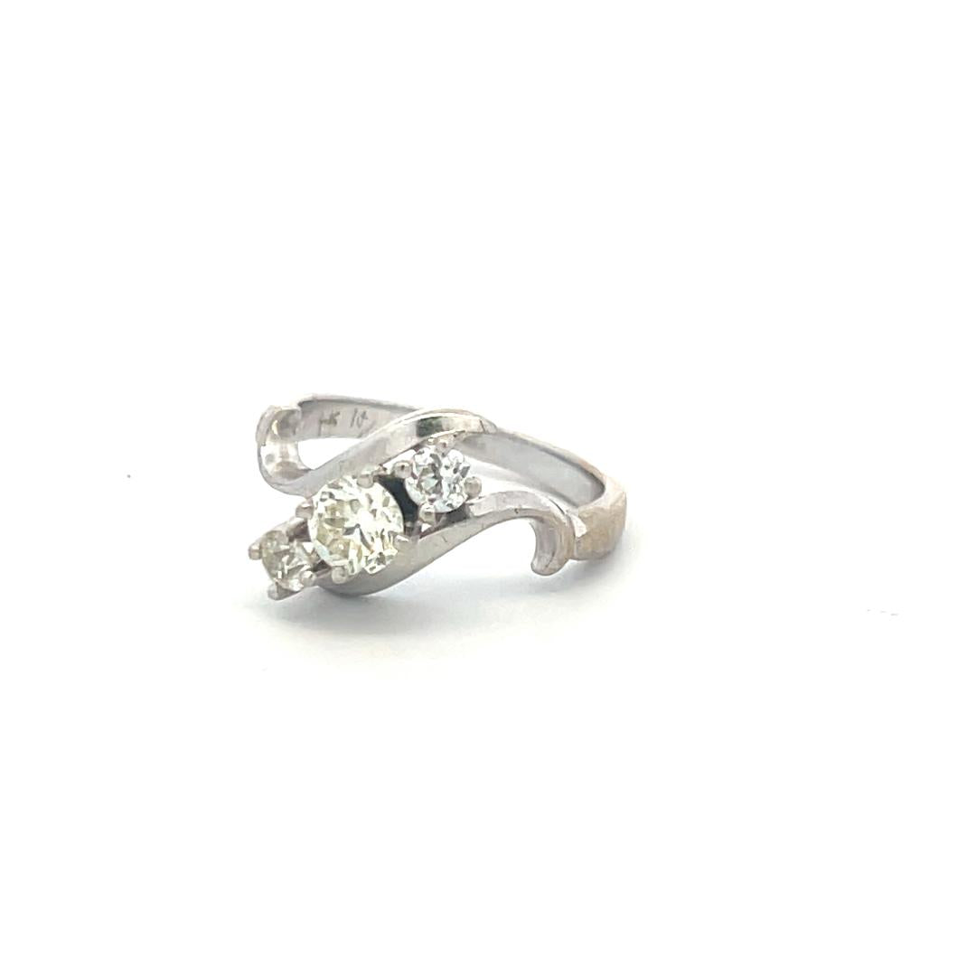 0.60 Carat Round Brilliant K-I VS Diamond 14 Karat White Gold Three-Stone Ring