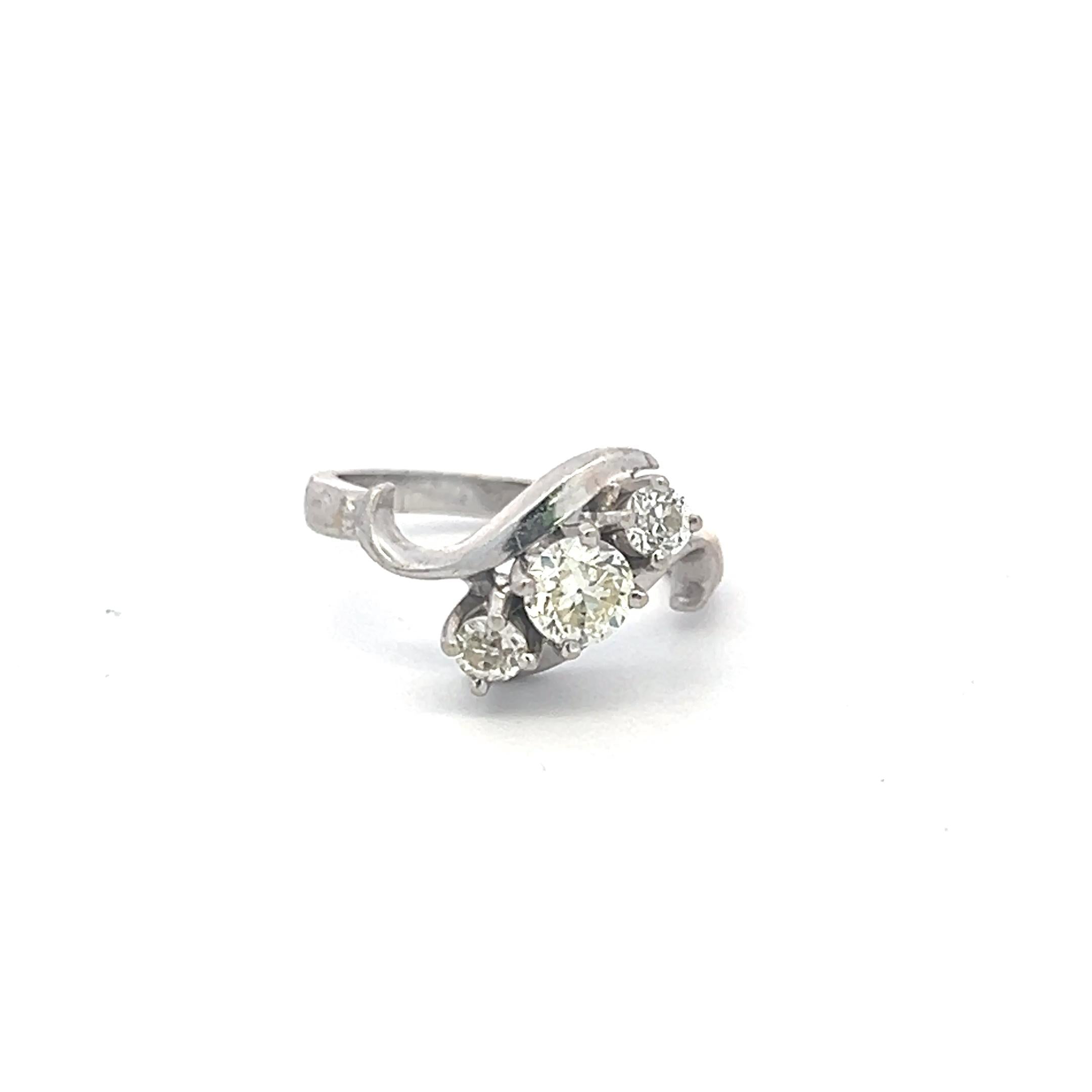 0.60 Carat Round Brilliant K-I VS Diamond 14 Karat White Gold Three-Stone Ring