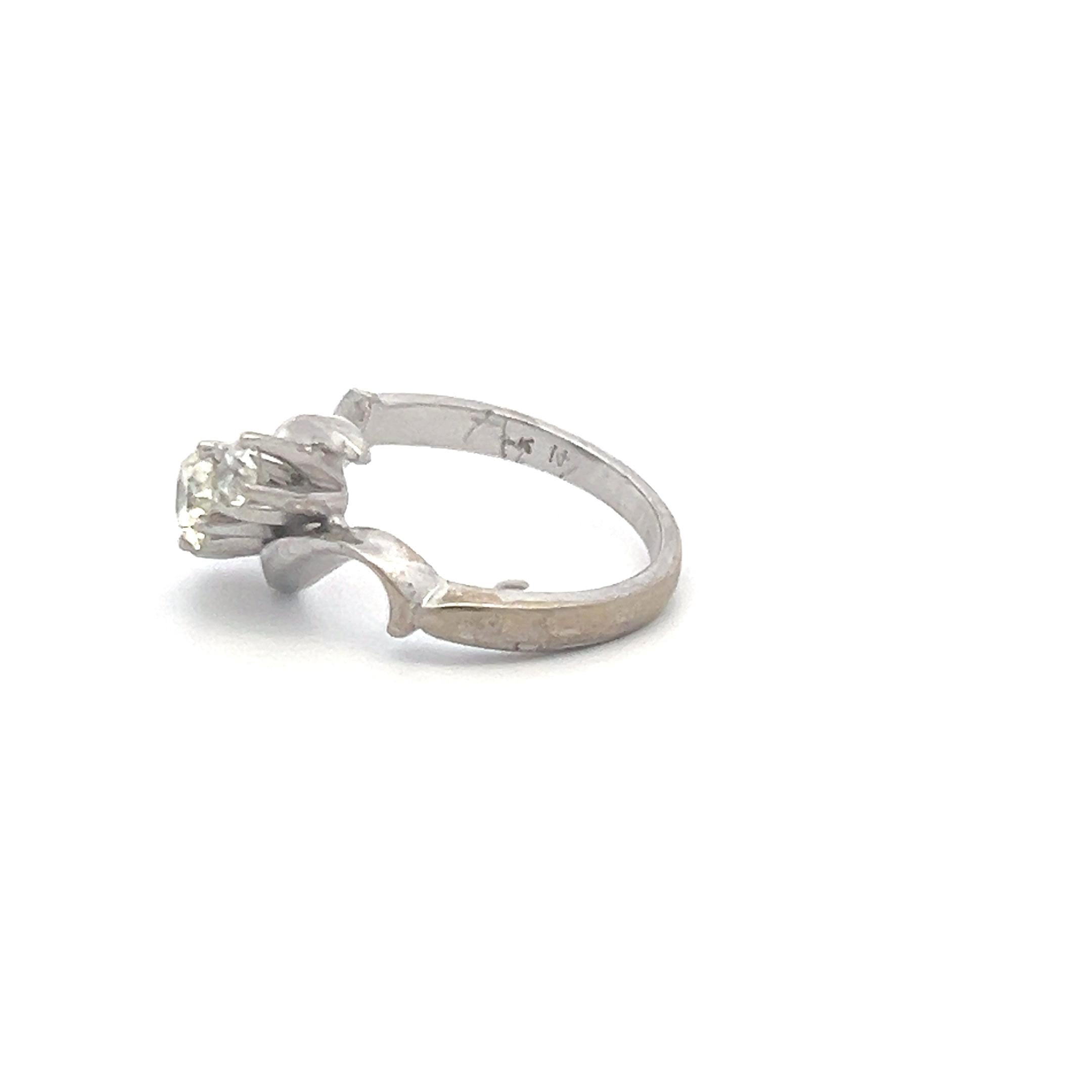 0.60 Carat Round Brilliant K-I VS Diamond 14 Karat White Gold Three-Stone Ring