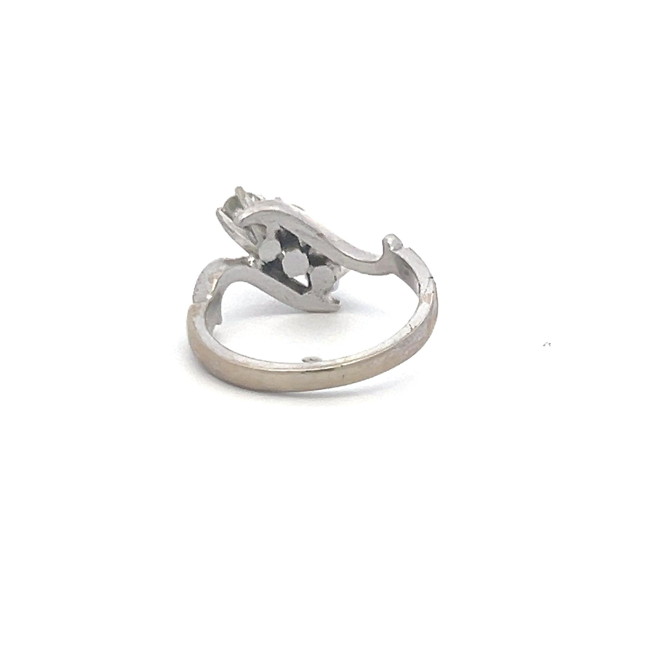 0.60 Carat Round Brilliant K-I VS Diamond 14 Karat White Gold Three-Stone Ring