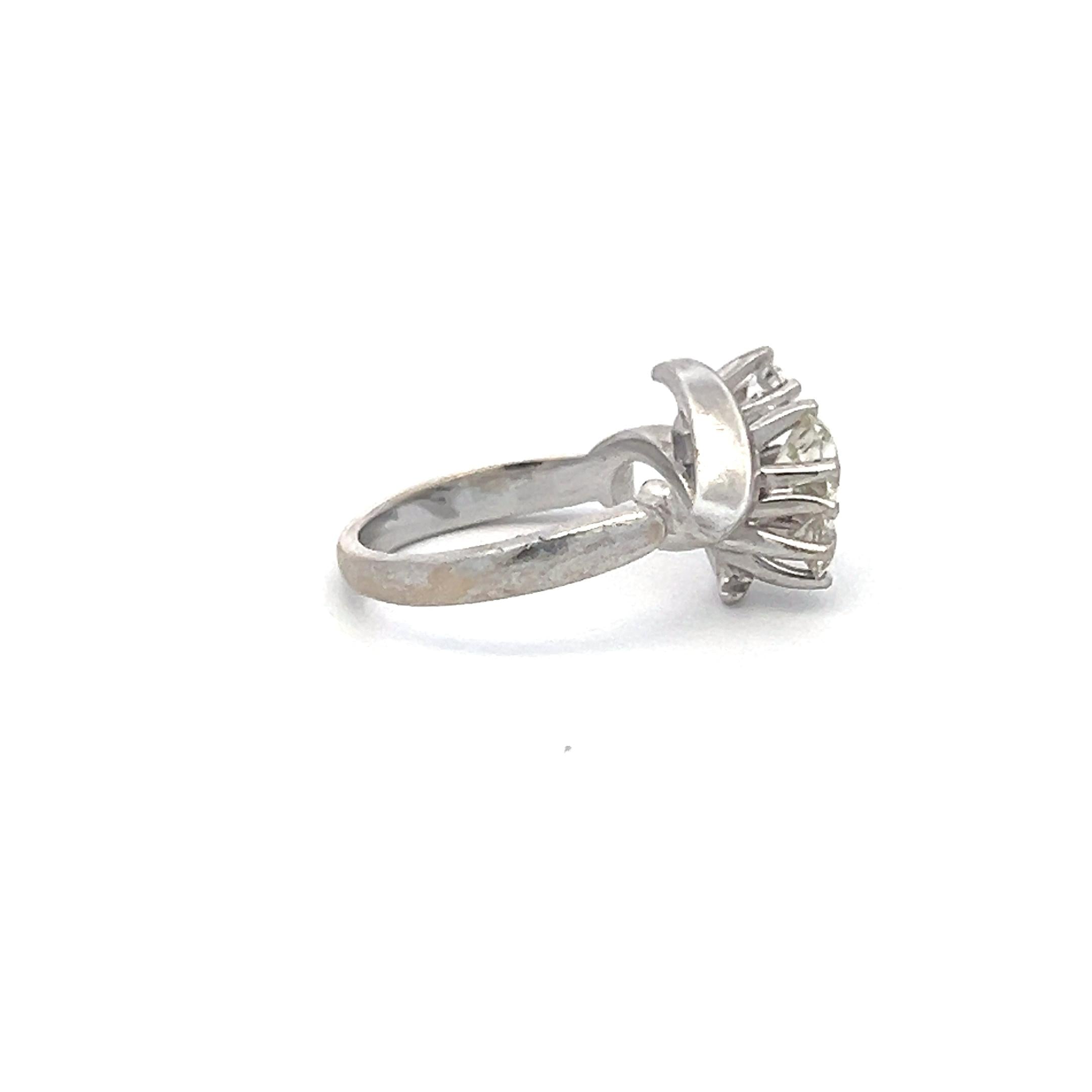 0.60 Carat Round Brilliant K-I VS Diamond 14 Karat White Gold Three-Stone Ring