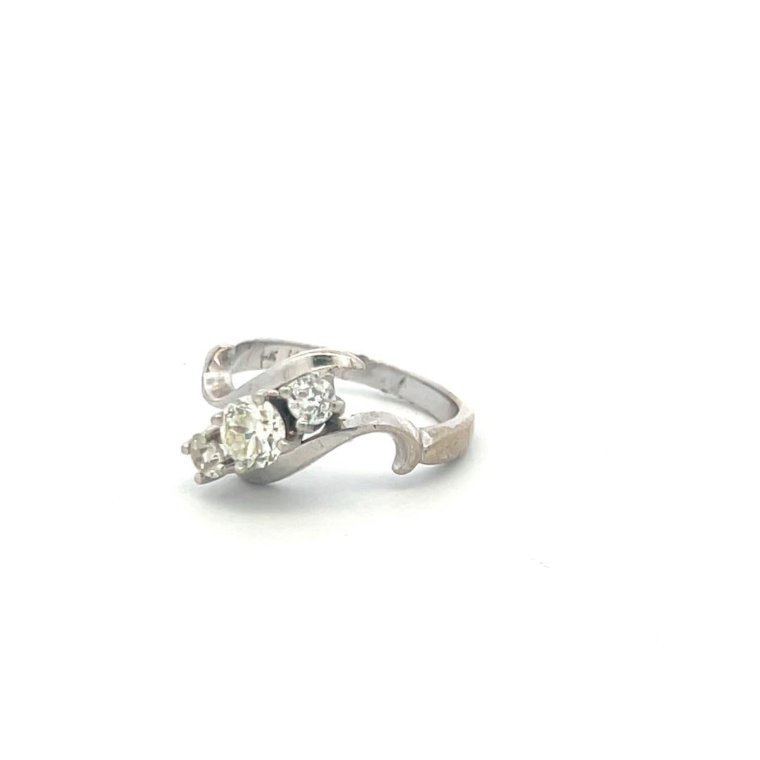 0.60 Carat Round Brilliant K-I VS Diamond 14 Karat White Gold Three-Stone Ring