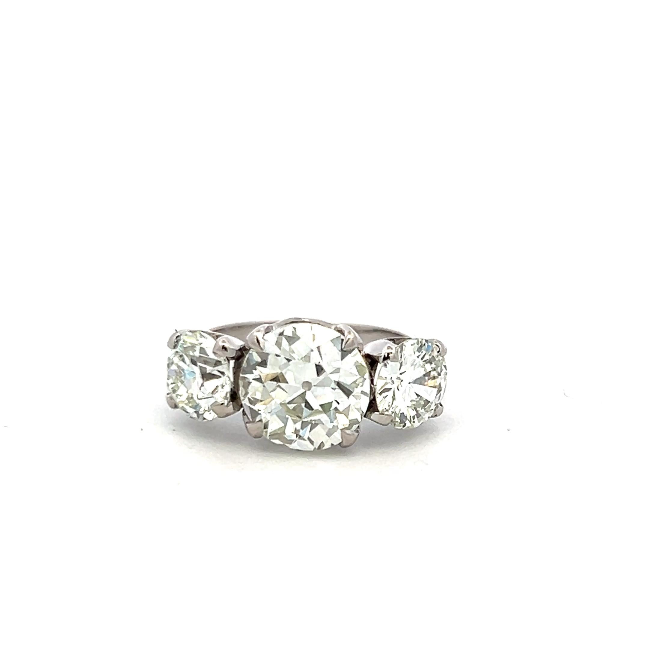 5.29 Carat Old European and Circular Brilliant Diamond Platinum Three-Stone Ring