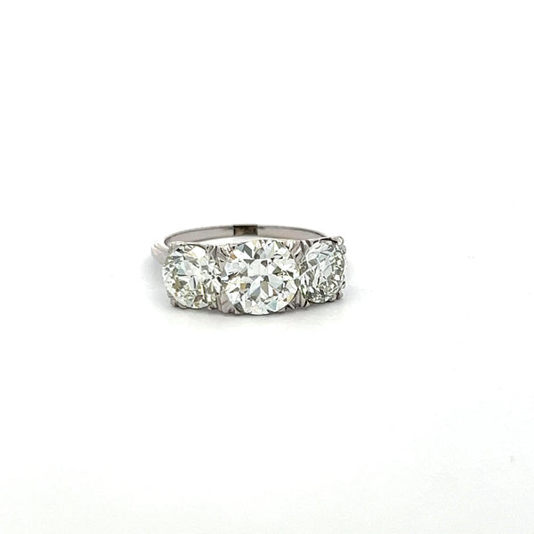 3.34 Carat Circular Brilliant Cut K-J SI1-VVS2 Diamond Platinum Three-Stone Ring