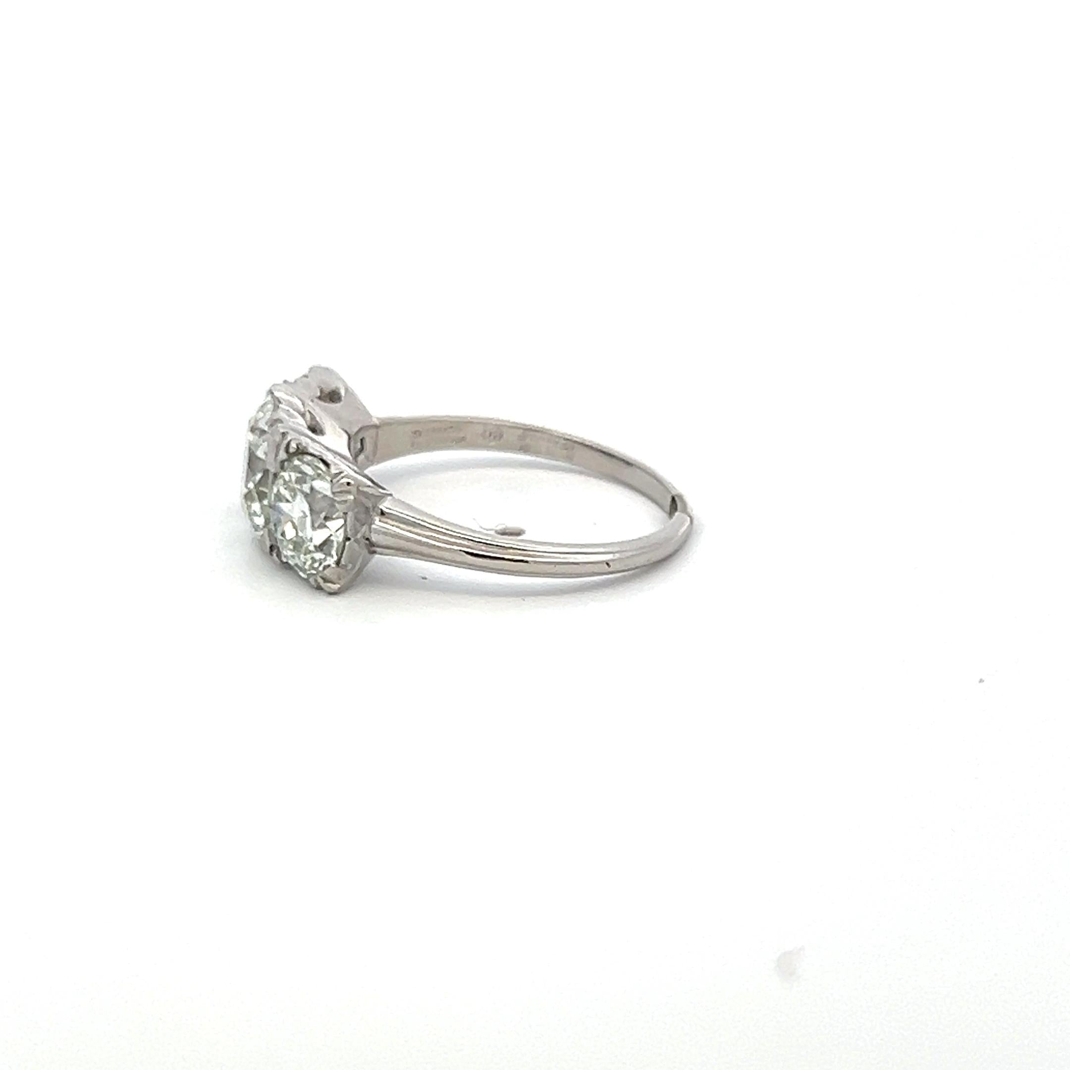 3.34 Carat Circular Brilliant Cut K-J SI1-VVS2 Diamond Platinum Three-Stone Ring