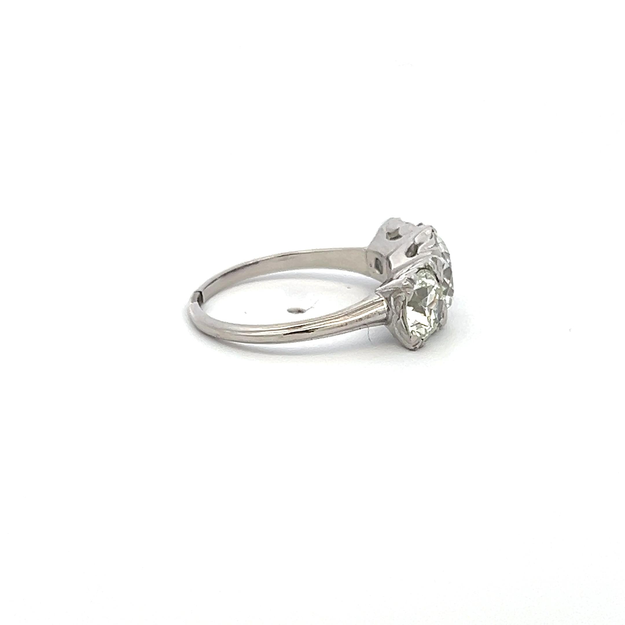 3.34 Carat Circular Brilliant Cut K-J SI1-VVS2 Diamond Platinum Three-Stone Ring