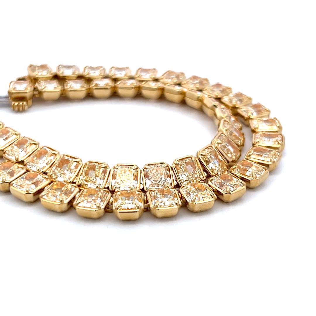 71.22 Carat Radiant Cut U VS Diamond 18 Karat Yellow Gold Riviera Necklace