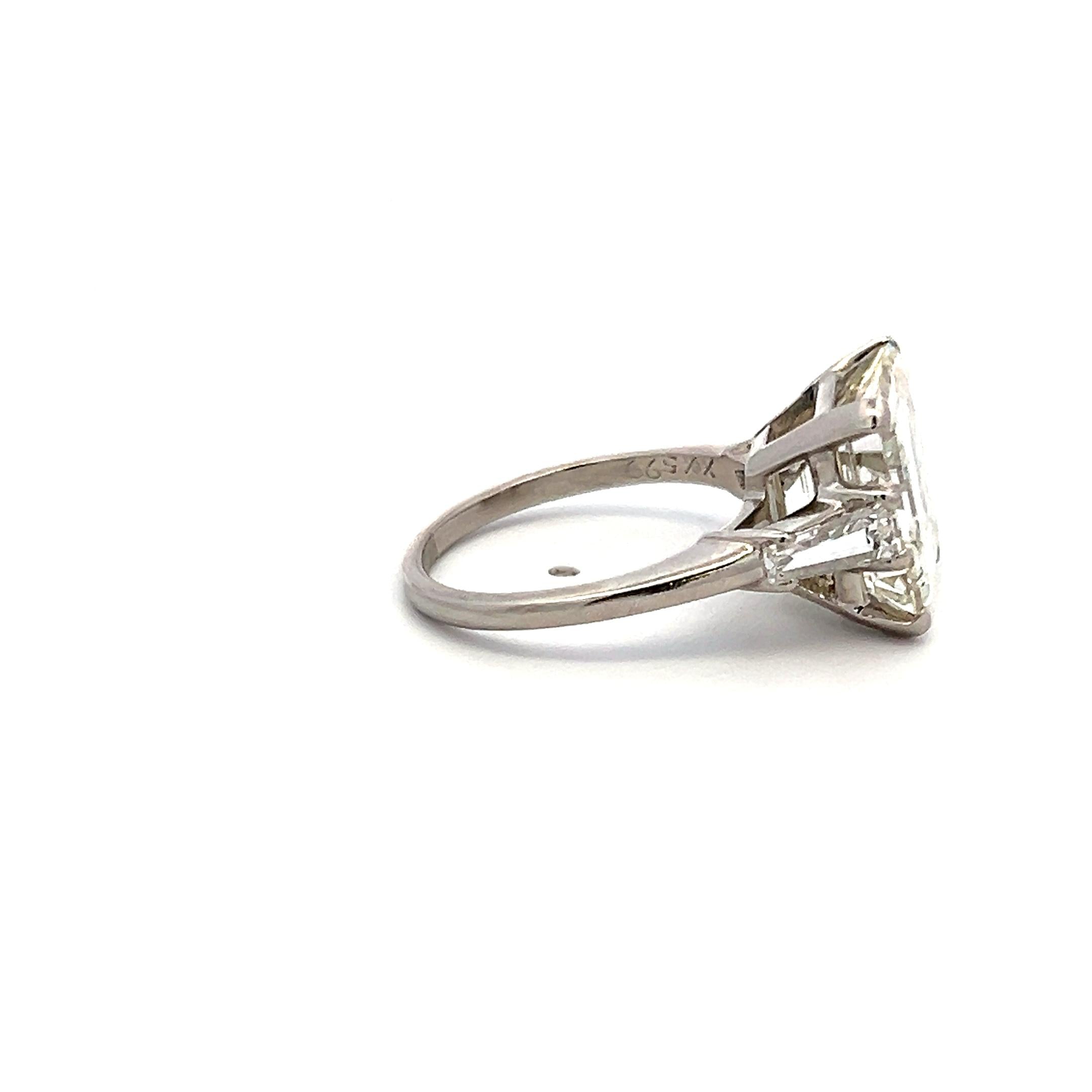 7.02 Carat Emerald Cut and Tapered Baguette Diamond Platinum Engagement Ring
