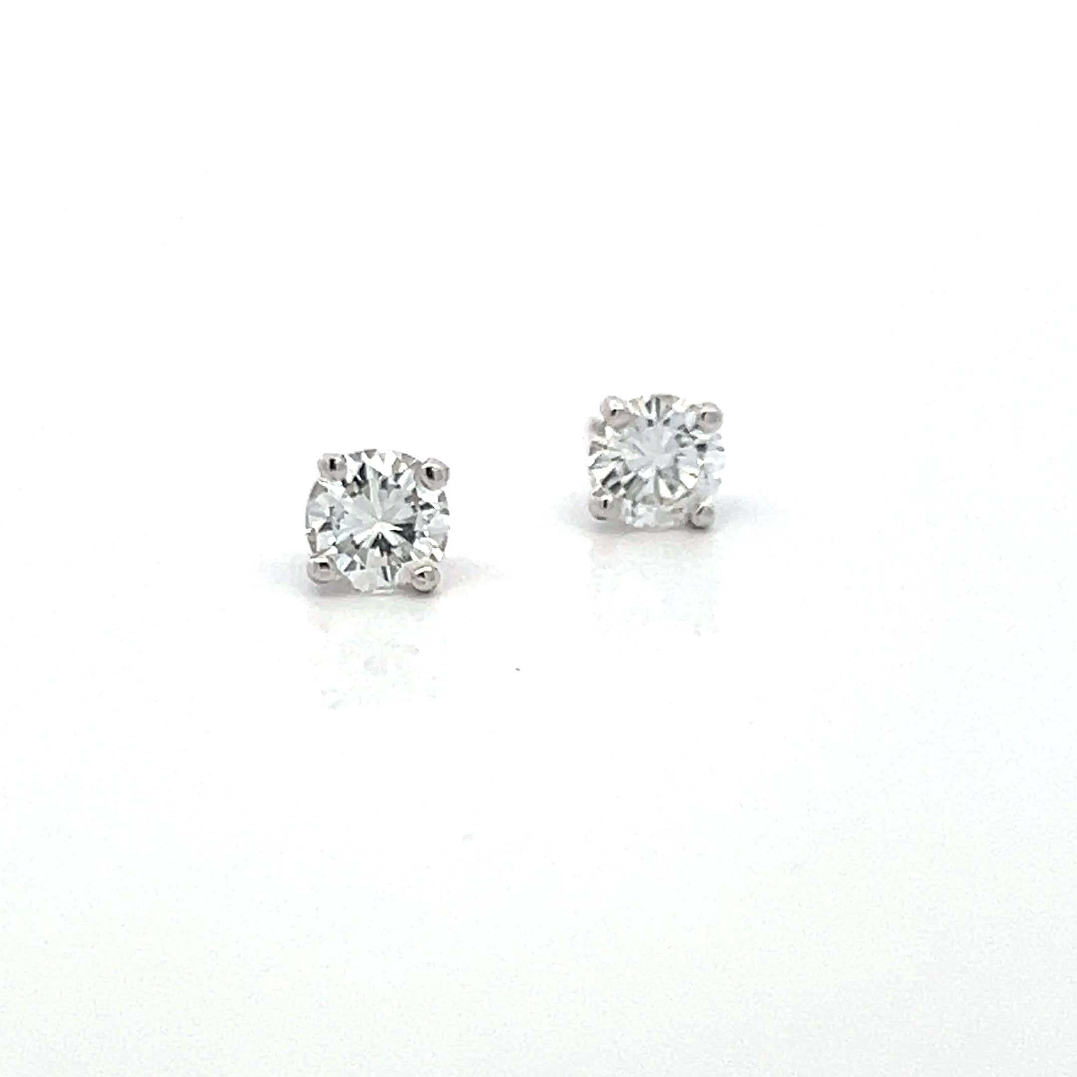 1.40 Carat Round Brilliant F VS2 Diamond 18 Karat White Gold Stud Earrings