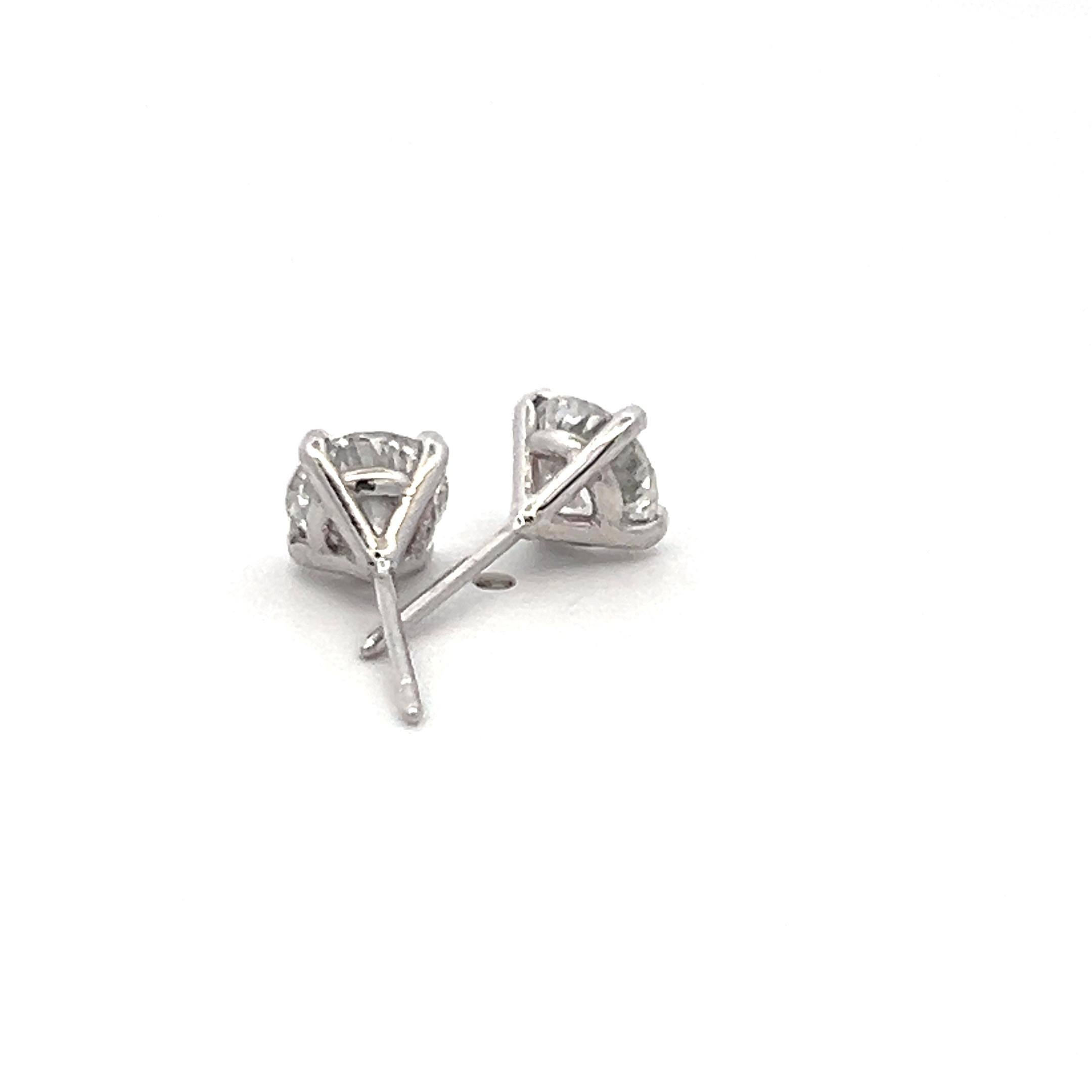 1.40 Carat Round Brilliant F VS2 Diamond 18 Karat White Gold Stud Earrings
