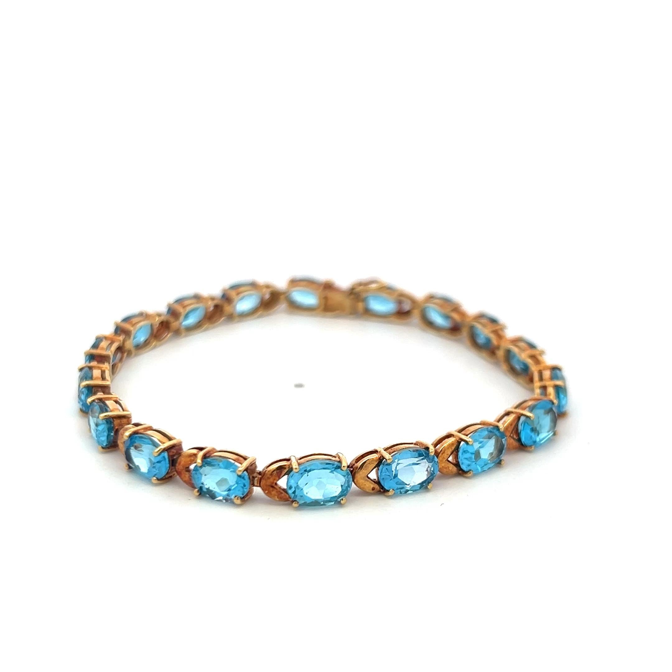 Vintage 21.00ct Oval Shape Blue Topaz Tennis Bracelet in 18K Yellow Gold