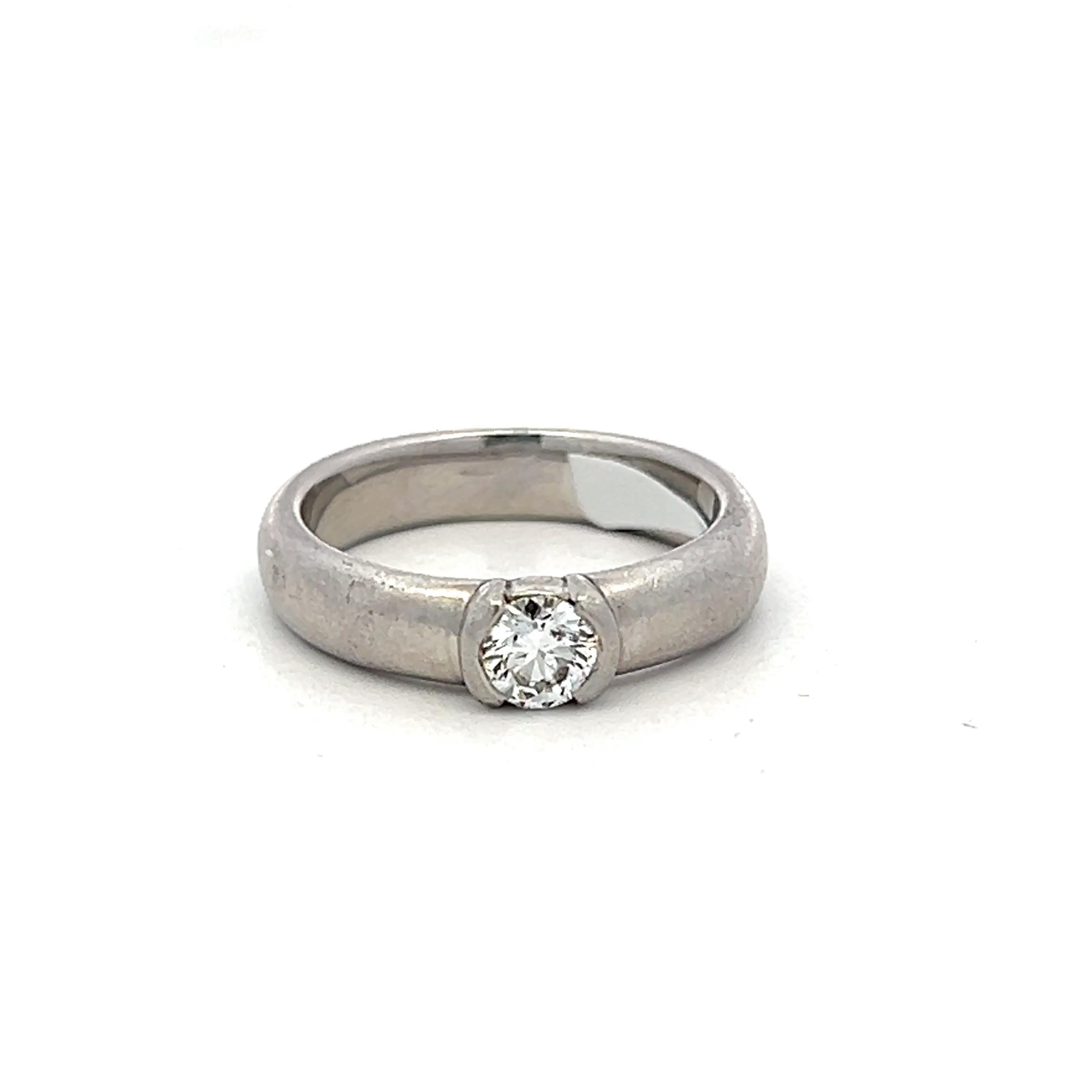 Tiffany & Co Vintage Platinum Engagement Ring with 0.3 Carat Round F VS Diamond