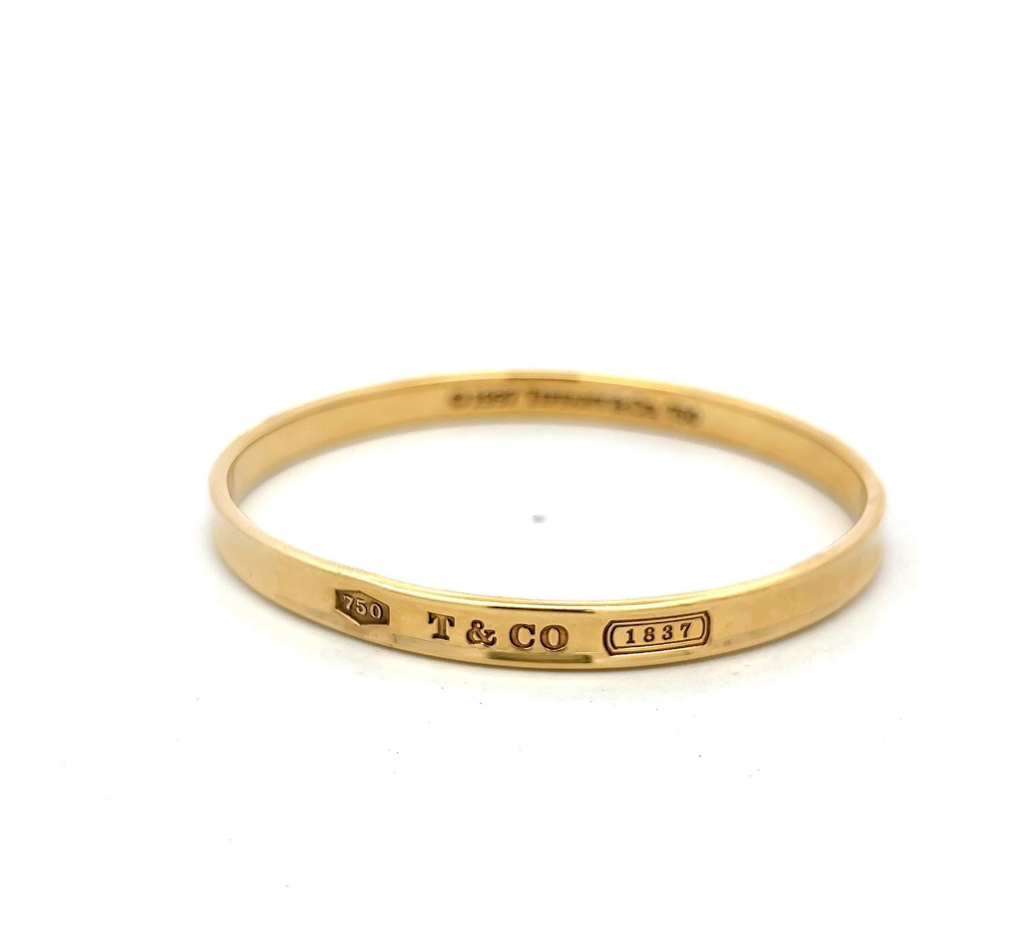 Tiffany & Co 18 Karat Yellow Gold Bangle Bracelet 27.9 Grams Size 6.75