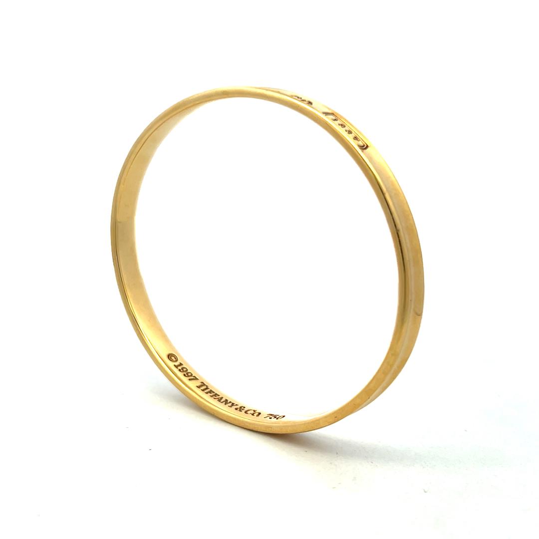 Tiffany & Co 18 Karat Yellow Gold Bangle Bracelet 27.9 Grams Size 6.75