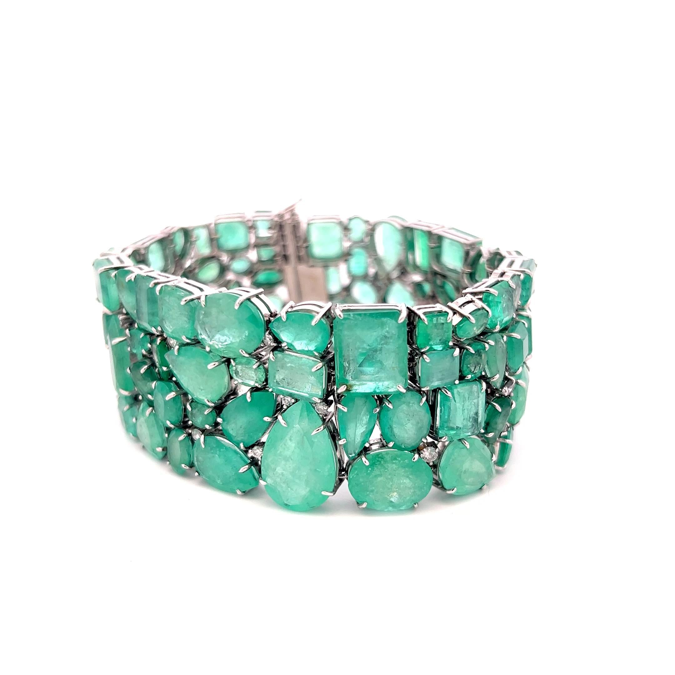 18K WG Link Bracelet with 1.5ct Round H SI Diamonds & 112ct Multi Shape Emerald