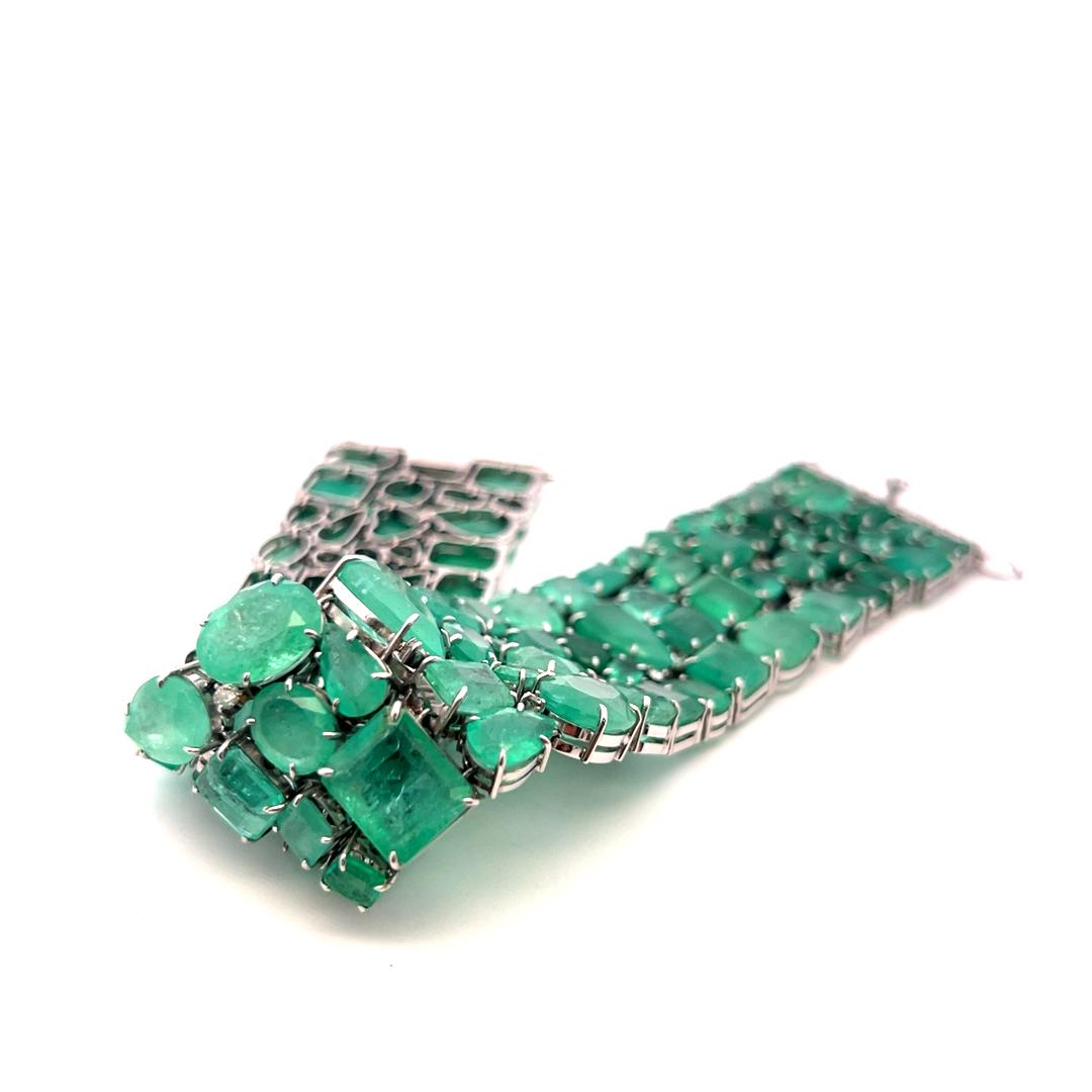 18K WG Link Bracelet with 1.5ct Round H SI Diamonds & 112ct Multi Shape Emerald