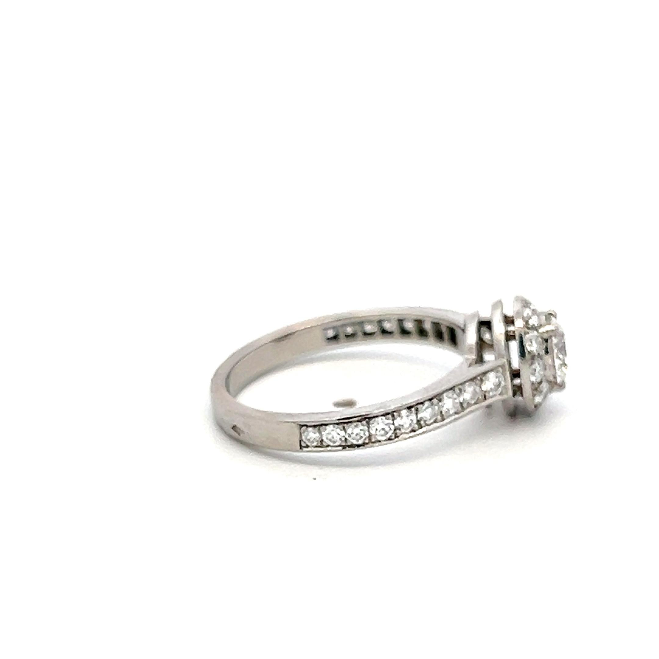 Van Cleef & Arpels Platinum Engagement Ring 0.77 Carat Round Diamonds E VVS2 GIA
