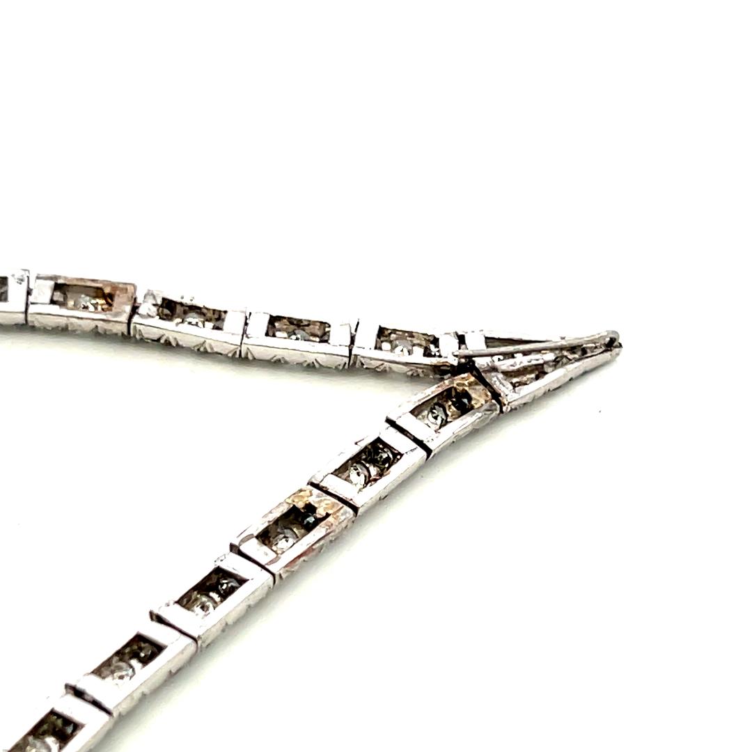 Vintage Gold Silver and Palladium V-shaped Necklace with 10.92 Carat Diamonds