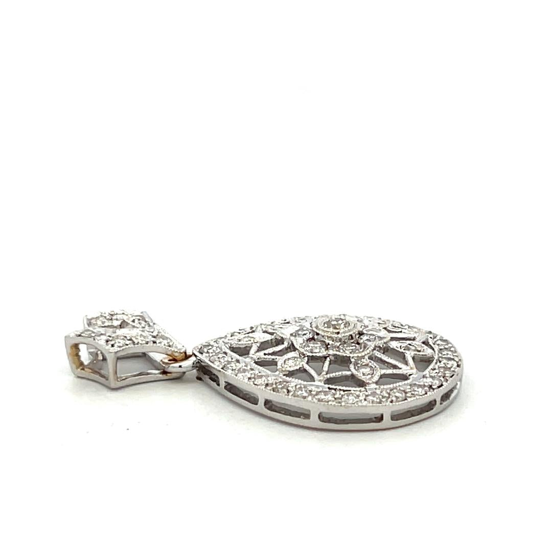 Vintage 18K White Gold Pendant with 0.75 Carat Round H SI Diamonds