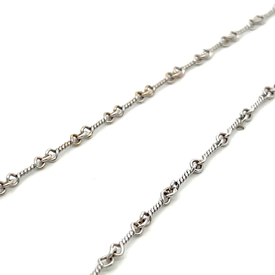 Vintage 18K White Gold Pendant Necklace with 0.65 Carat Round H VS Diamonds