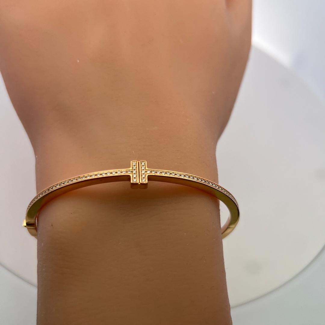 Tiffany & Co 18K Rose Gold Bangle Bracelet with 0.33 Carat Round F VVS Diamonds