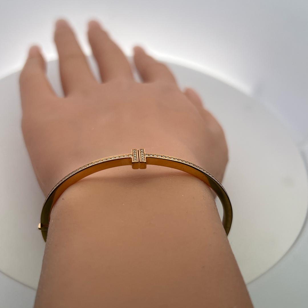 Tiffany & Co 18K Rose Gold Bangle Bracelet with 0.33 Carat Round F VVS Diamonds