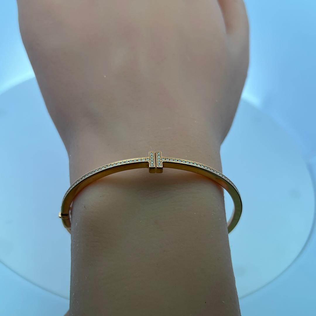 Tiffany & Co 18K Rose Gold Bangle Bracelet with 0.33 Carat Round F VVS Diamonds