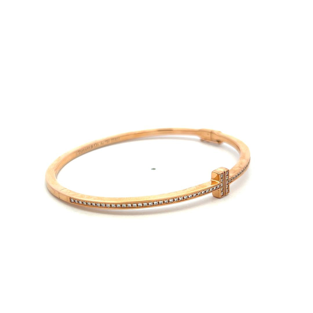 Tiffany & Co 18K Rose Gold Bangle Bracelet with 0.33 Carat Round F VVS Diamonds