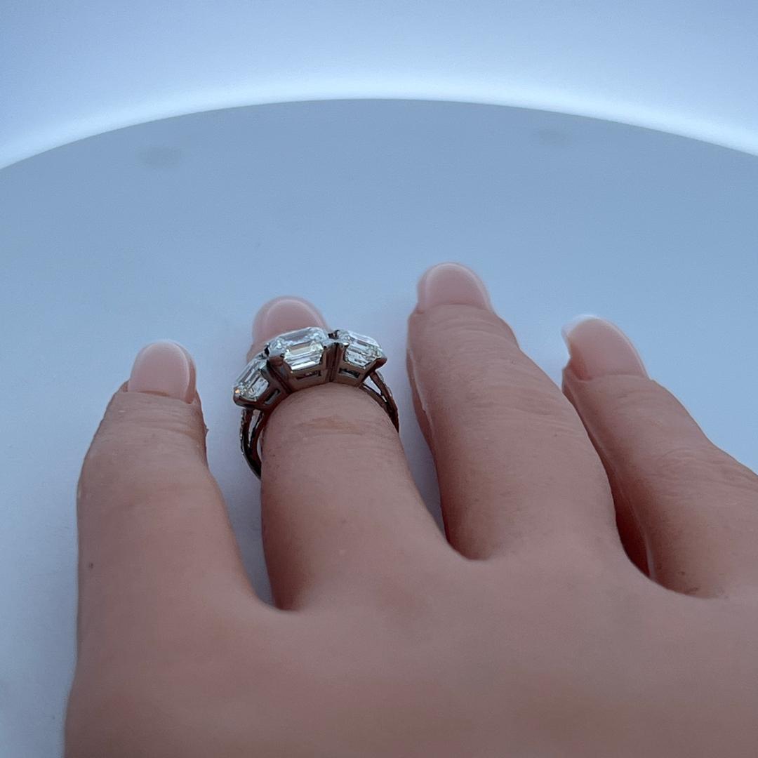 Vintage White Platinum Three-Stone Ring with 3.92 Carat Asscher Cut Diamonds GIA