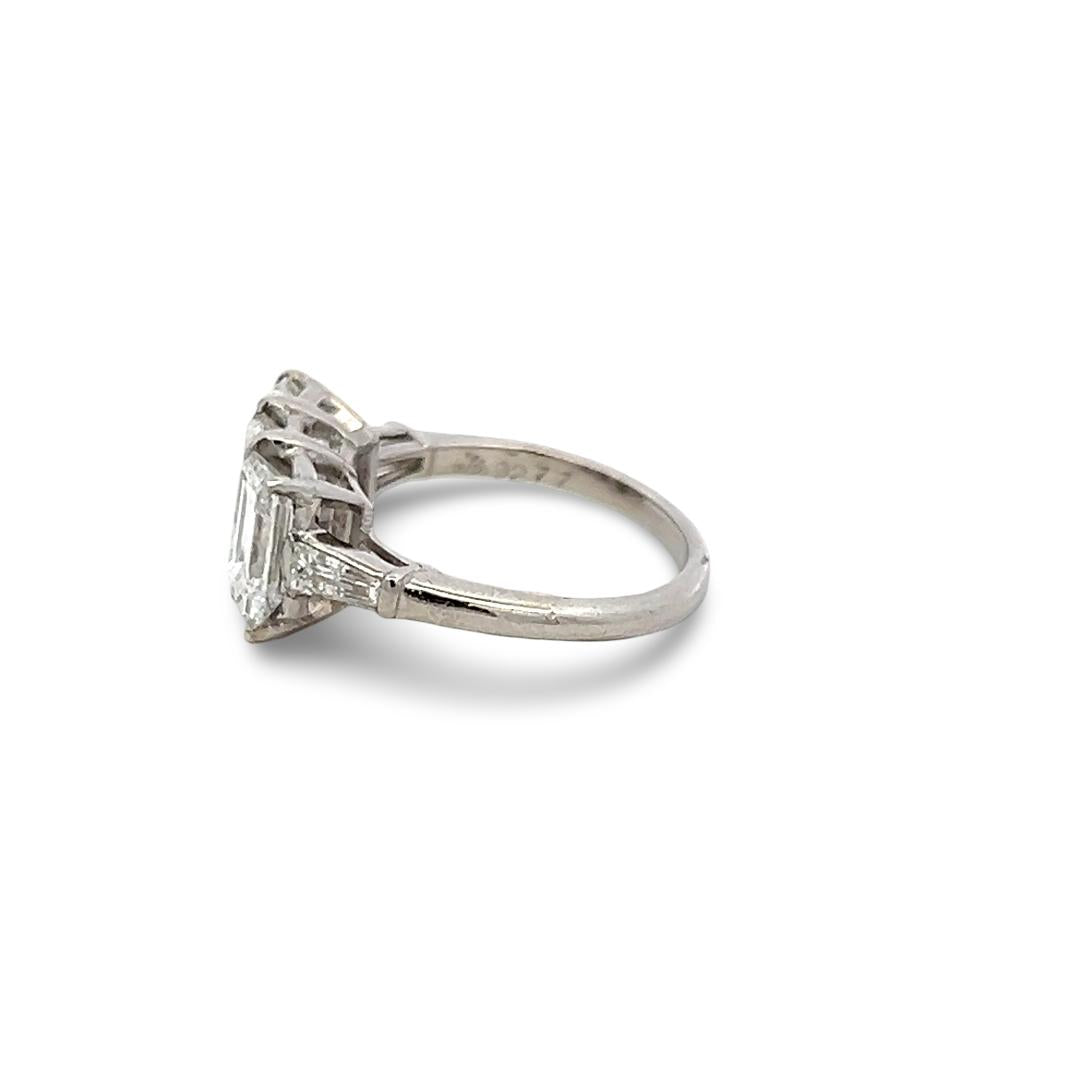 Platinum Three-Stone Ring with 3.27 Carat Emerald Cut Diamonds Size 4.5 GIA