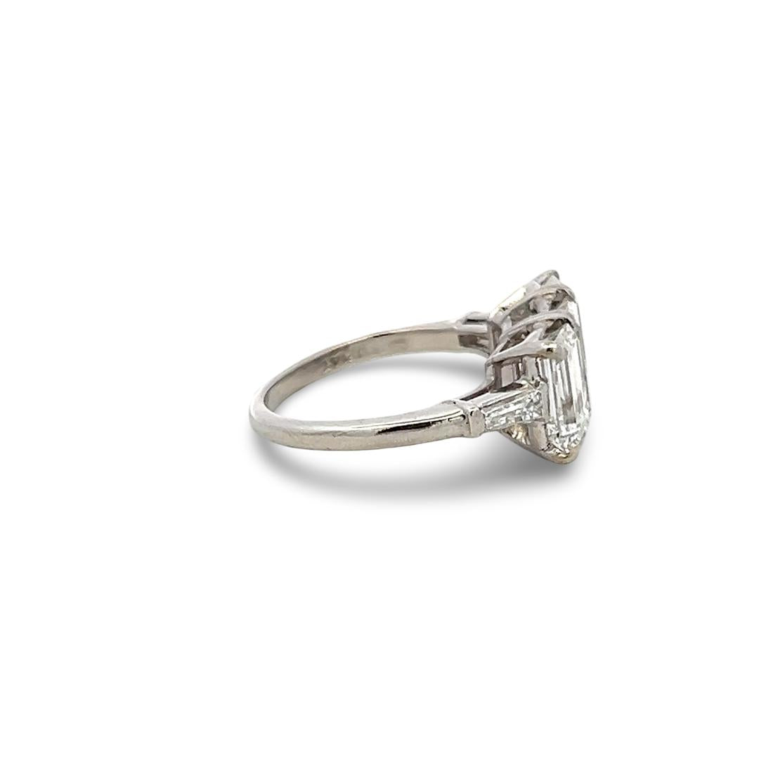 Platinum Three-Stone Ring with 3.27 Carat Emerald Cut Diamonds Size 4.5 GIA