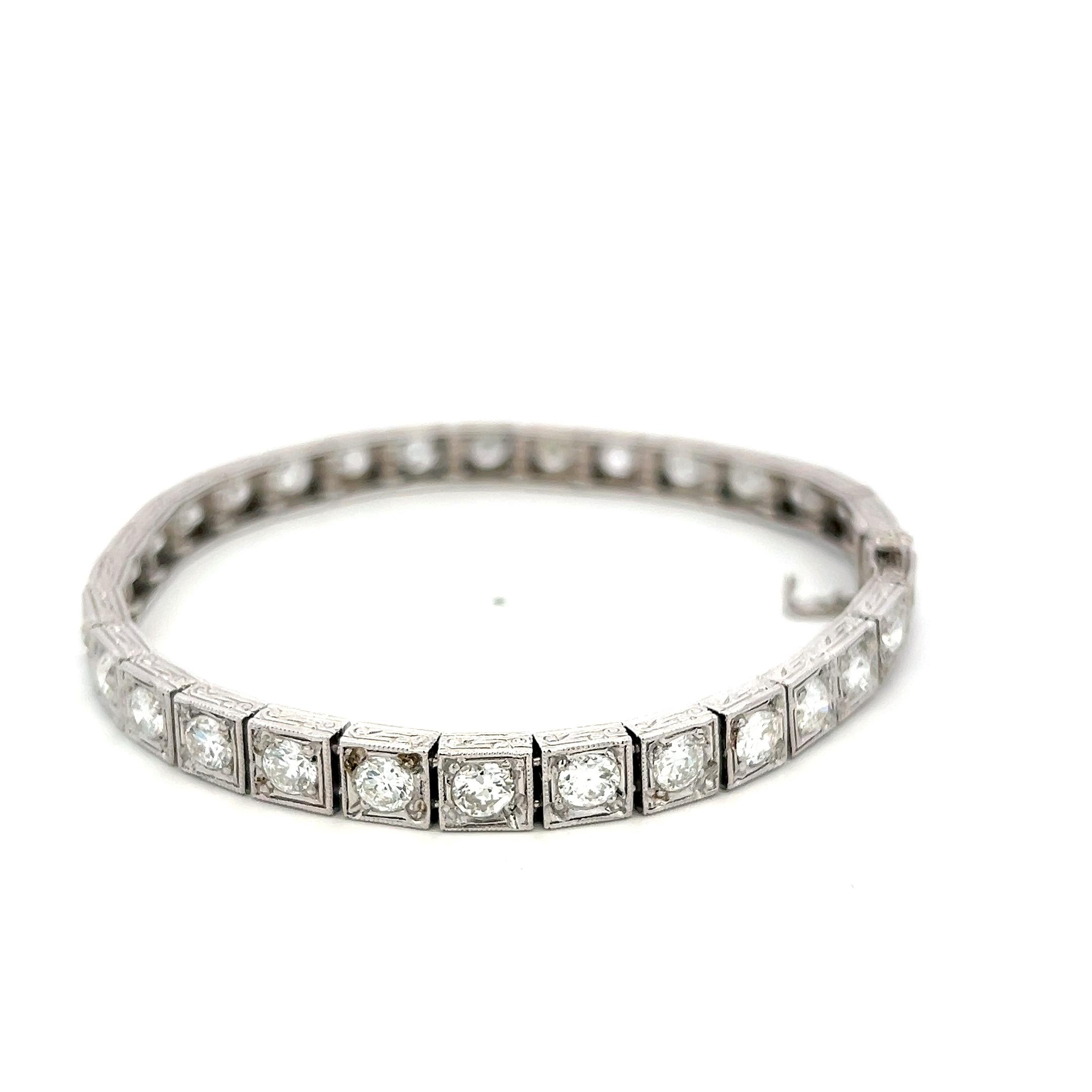 Vintage Platinum Tennis Bracelet with 6.94 Carat Old European H VS Diamonds