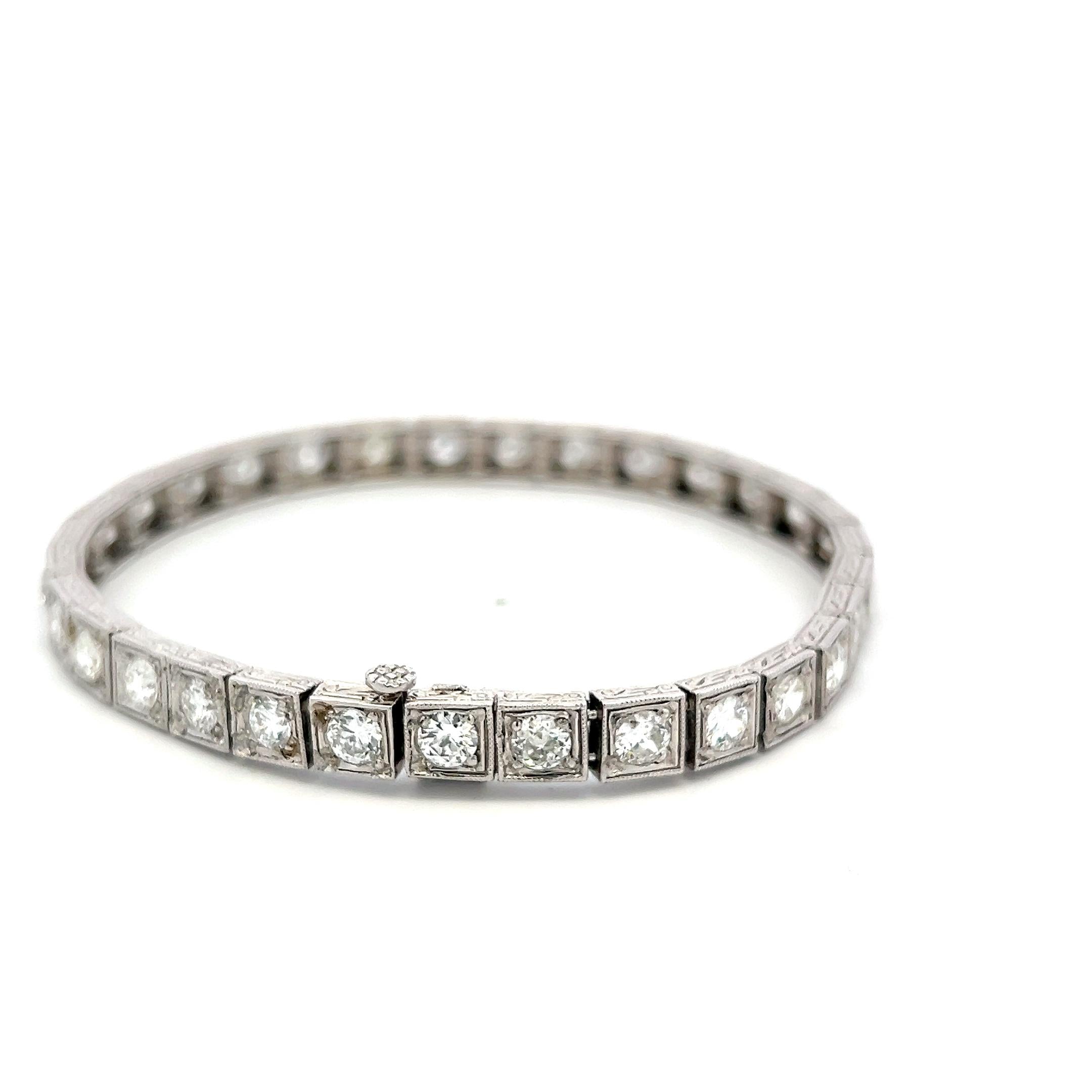 Vintage Platinum Tennis Bracelet with 6.94 Carat Old European H VS Diamonds