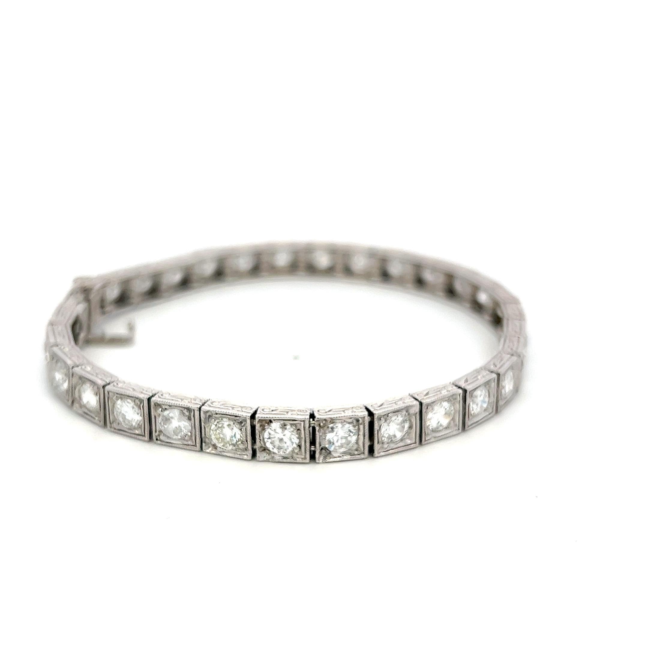 Vintage Platinum Tennis Bracelet with 6.94 Carat Old European H VS Diamonds