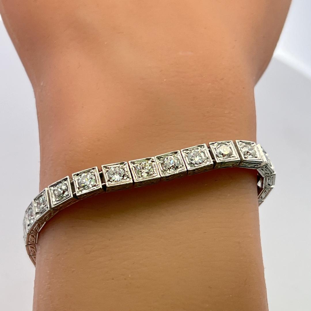 Vintage Platinum Tennis Bracelet with 6.94 Carat Old European H VS Diamonds
