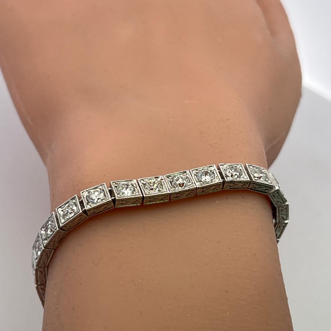 Vintage Platinum Tennis Bracelet with 6.94 Carat Old European H VS Diamonds