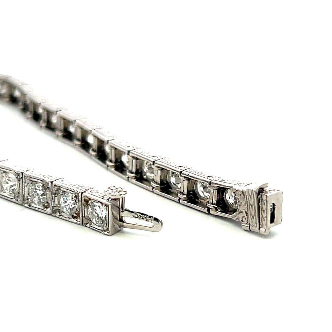 Vintage Platinum Tennis Bracelet with 6.94 Carat Old European H VS Diamonds