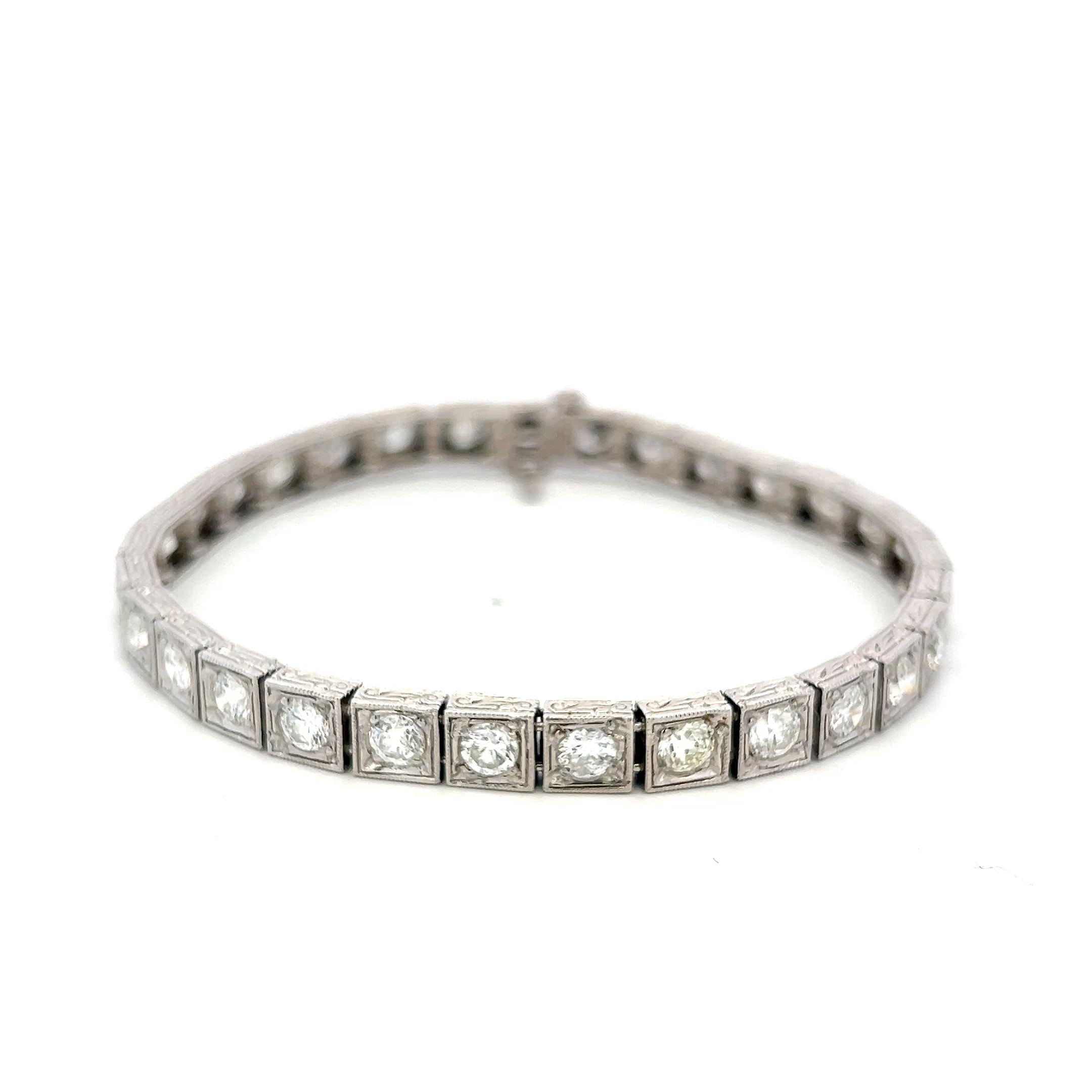 Vintage Platinum Tennis Bracelet with 6.94 Carat Old European H VS Diamonds